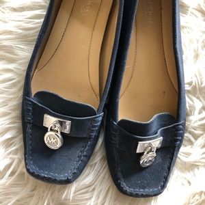 Blue suede navy blue Michael Kors loafers.